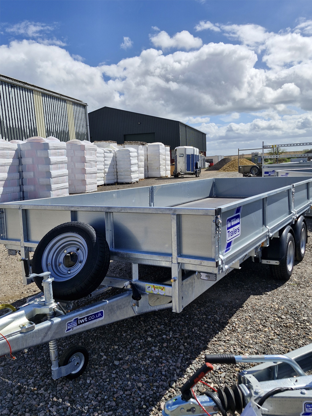 Ifor Williams LM1666 Flatbed Trailer with drop sides, twin axle, and spare wheel