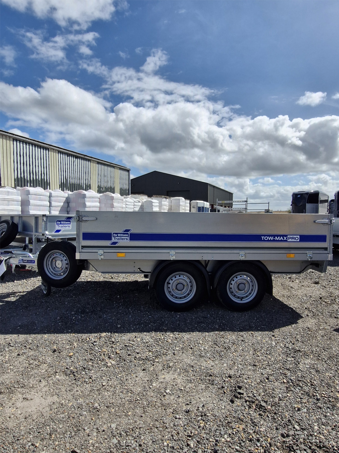 Ifor Williams TM272-2817 Tow-Max Pro Flatbed Trailer side view with twin axles