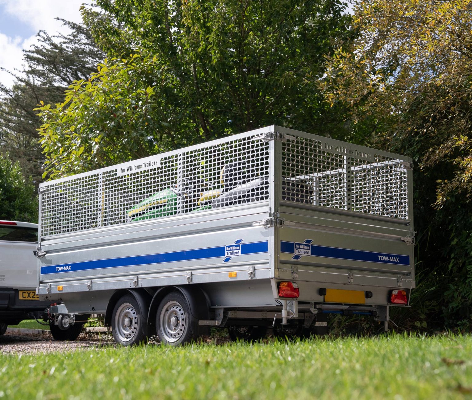 Ifor Williams Tow-Max trailer with mesh sides attached to a vehicle.